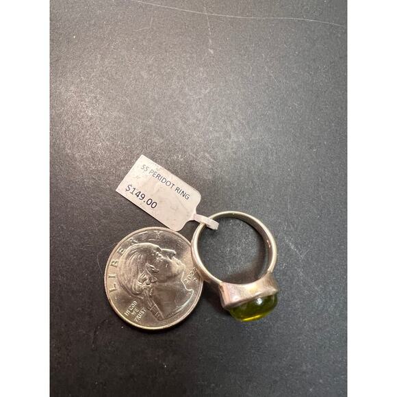 SOLD 

NEW size 7 oval peridot sterling silver ring 6.20 grams - Picture 10 of 15